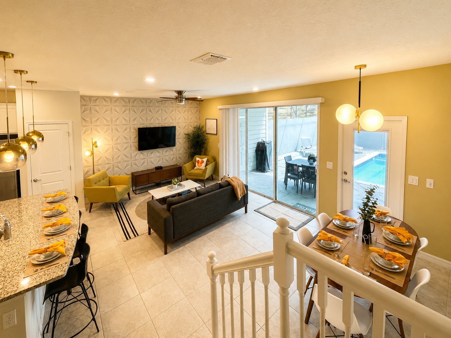 Open-plan living, dining and kitchen furnished for a family vacation home
