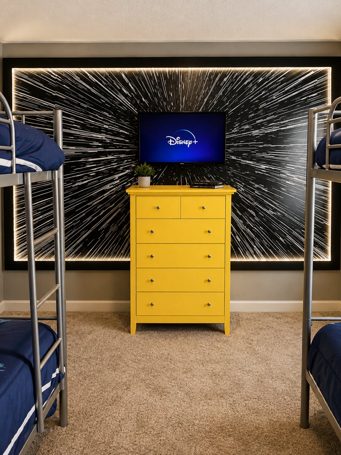 Kids bunk room with illuminated feature wall and bright yellow dresser